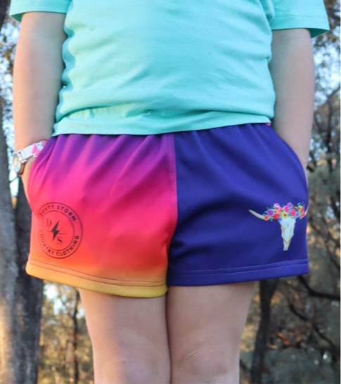 Sunrise cowgirl Footy shorts